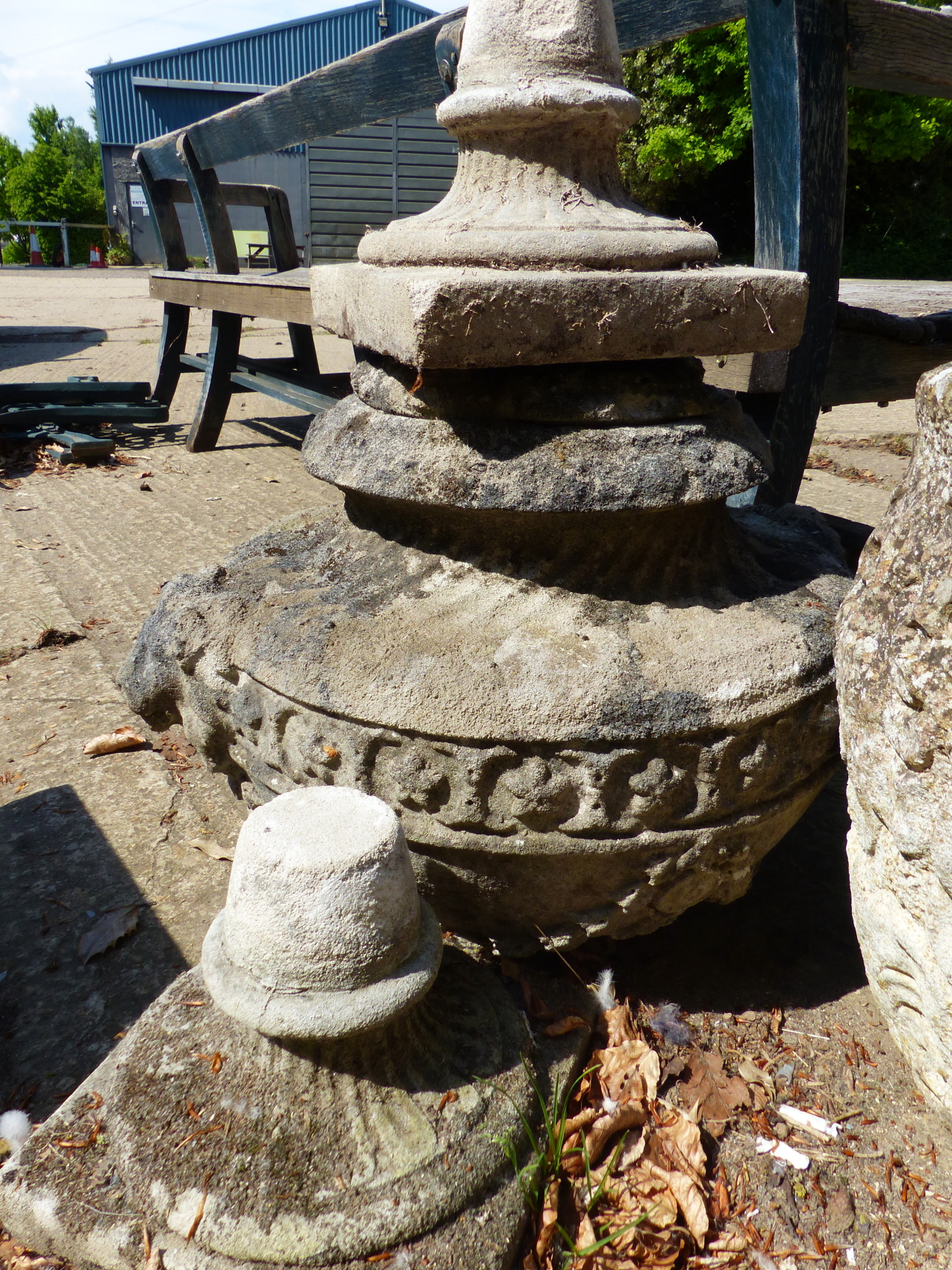 A SET OF FOUR CLASSICAL STYLE SWAG DECORATED COMPOSITE STONE GARDEN URNS, H 55cms. - Image 6 of 7