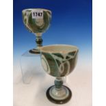 A PAIR OF ALAN CAIGER SMITH ALDERMASTON POTTERY GOBLETS PAINTED WITH OLIVE GREY SCROLLS ON A WHITE