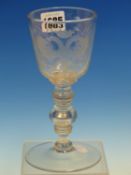 A SODA GLASS WINE, THE BOWL ENGRAVED VIVAT OVER A CROWNED DOUBLE HEADED EAGLE, THE STEM WITH DISC