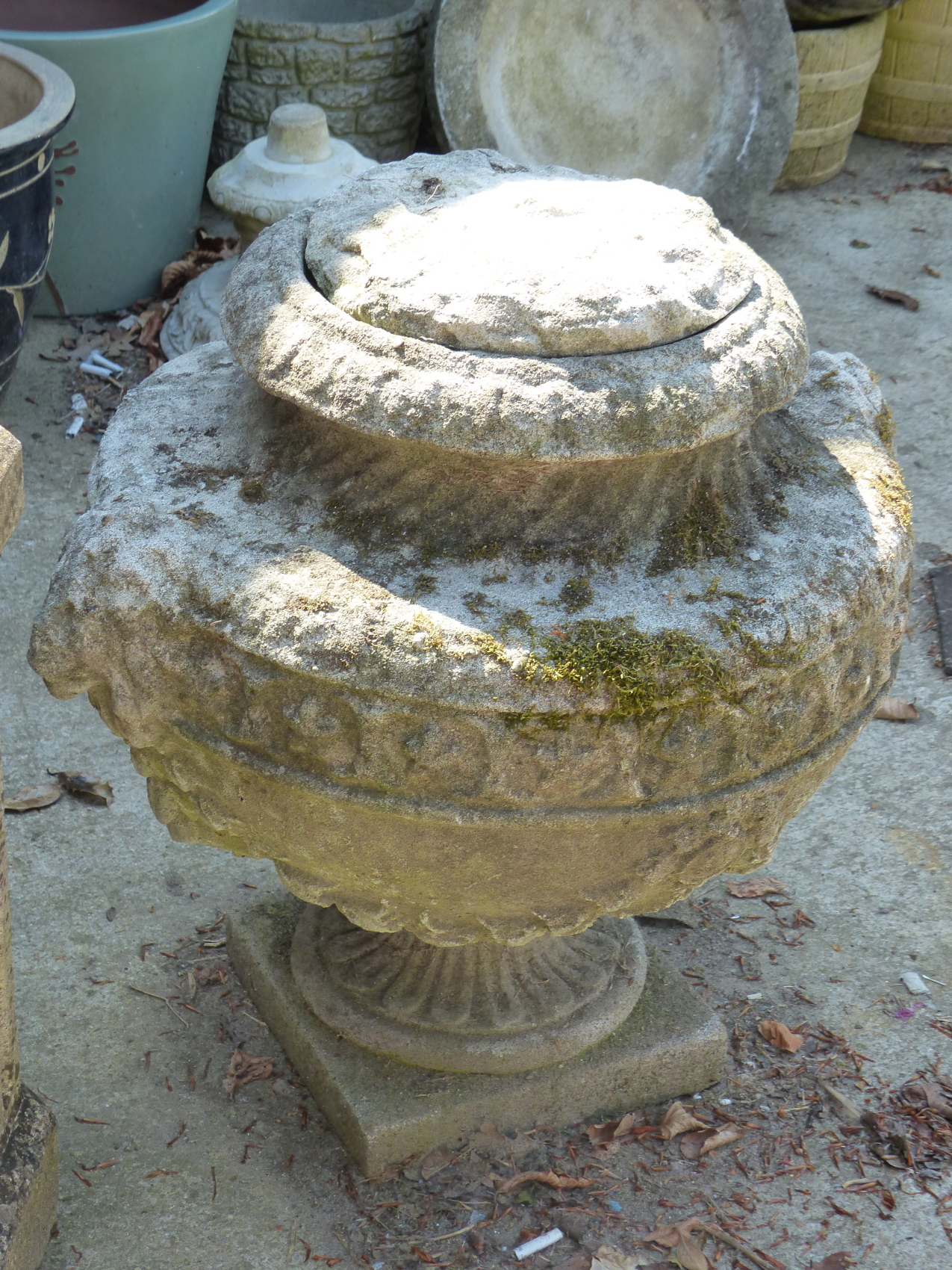 A SET OF FOUR CLASSICAL STYLE SWAG DECORATED COMPOSITE STONE GARDEN URNS, H 55cms. - Image 7 of 7