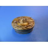 A JAPANESE COPPER AND GOLD INLAID WHITE METAL OVAL BOX, THE LID WORKED WITH A SHIP UNDER SAIL AND