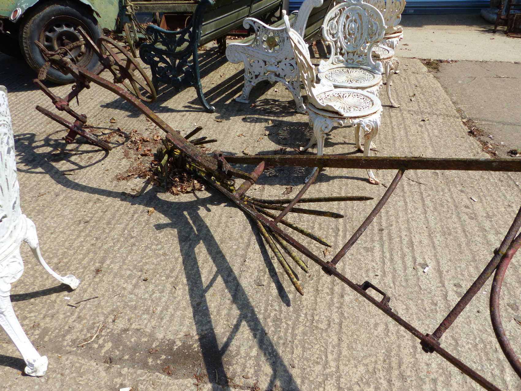 AN ANTIQUE HORSE DRAWN POTATO PLOUGH.