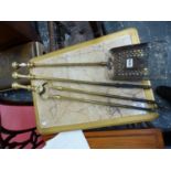 A SET OF VICTORIAN BRASS FIRE TOOLS, THE POKER L.67cms.