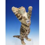A WINSTANLEY MARTINI ADVERTISING CAT STANDING ON ITS HIND LEGS WITH FRONT PAWS RAISED. H 31cms.