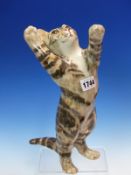 A WINSTANLEY MARTINI ADVERTISING CAT STANDING ON ITS HIND LEGS WITH FRONT PAWS RAISED. H 31cms.