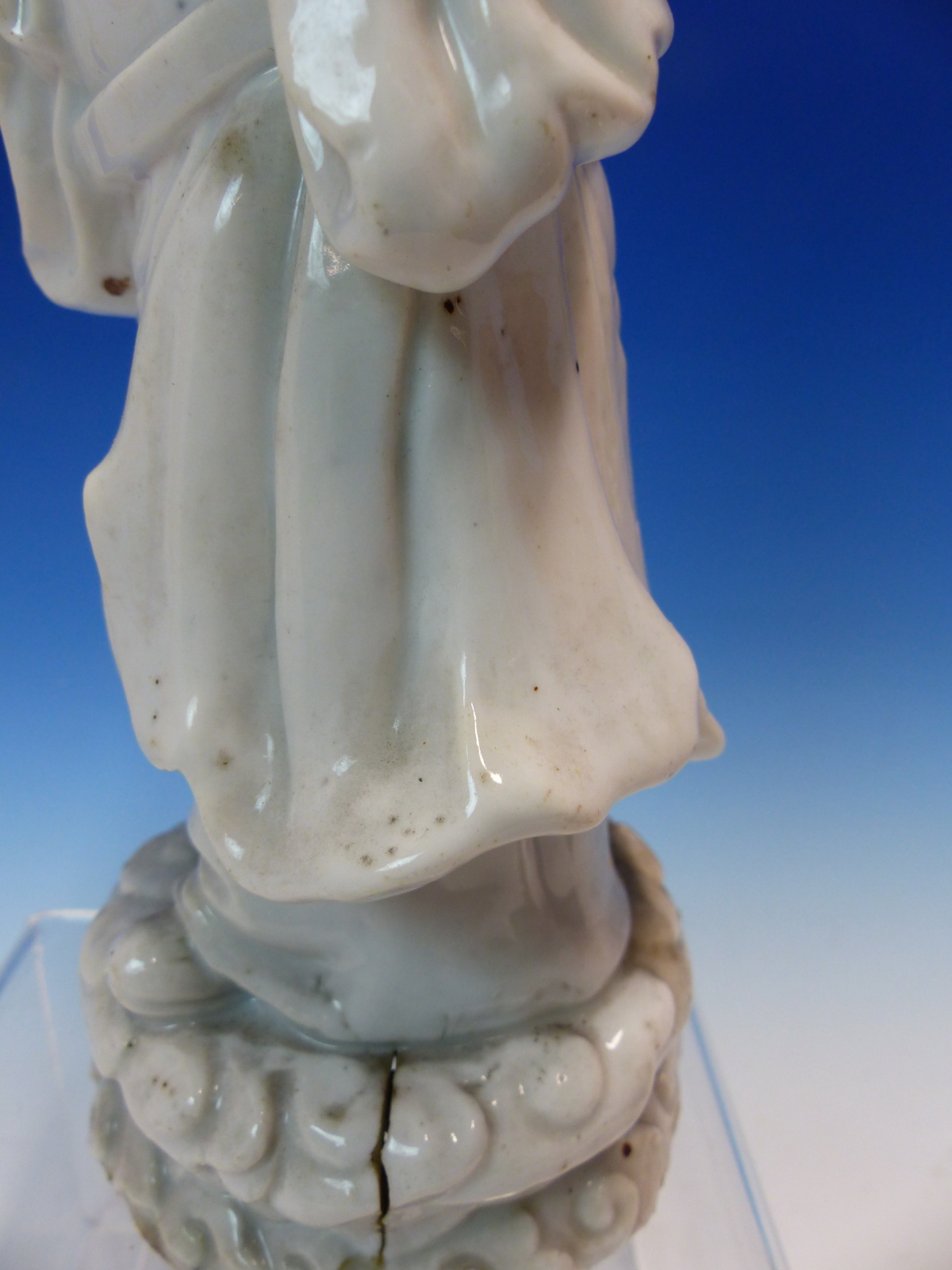 A BLANC DE CHINE FIGURE OF A FIERCE EYED MANDARIN STANDING ON A DOUBLE CLOUD PLINTH, HIS CHIN - Image 16 of 48