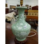 A CHINESE CELADON GROUND TWO HANDLED BOTTLE VASE AS A LAMP, THE BODY DECORATED IN WHITE WITH BATS,