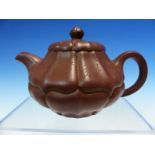 A YIXING TEA POT, TWO OTHERS CHINESE AND AN ENGLISH TREACLE WARE TEA POT, THREE CHINESE BLUE AND