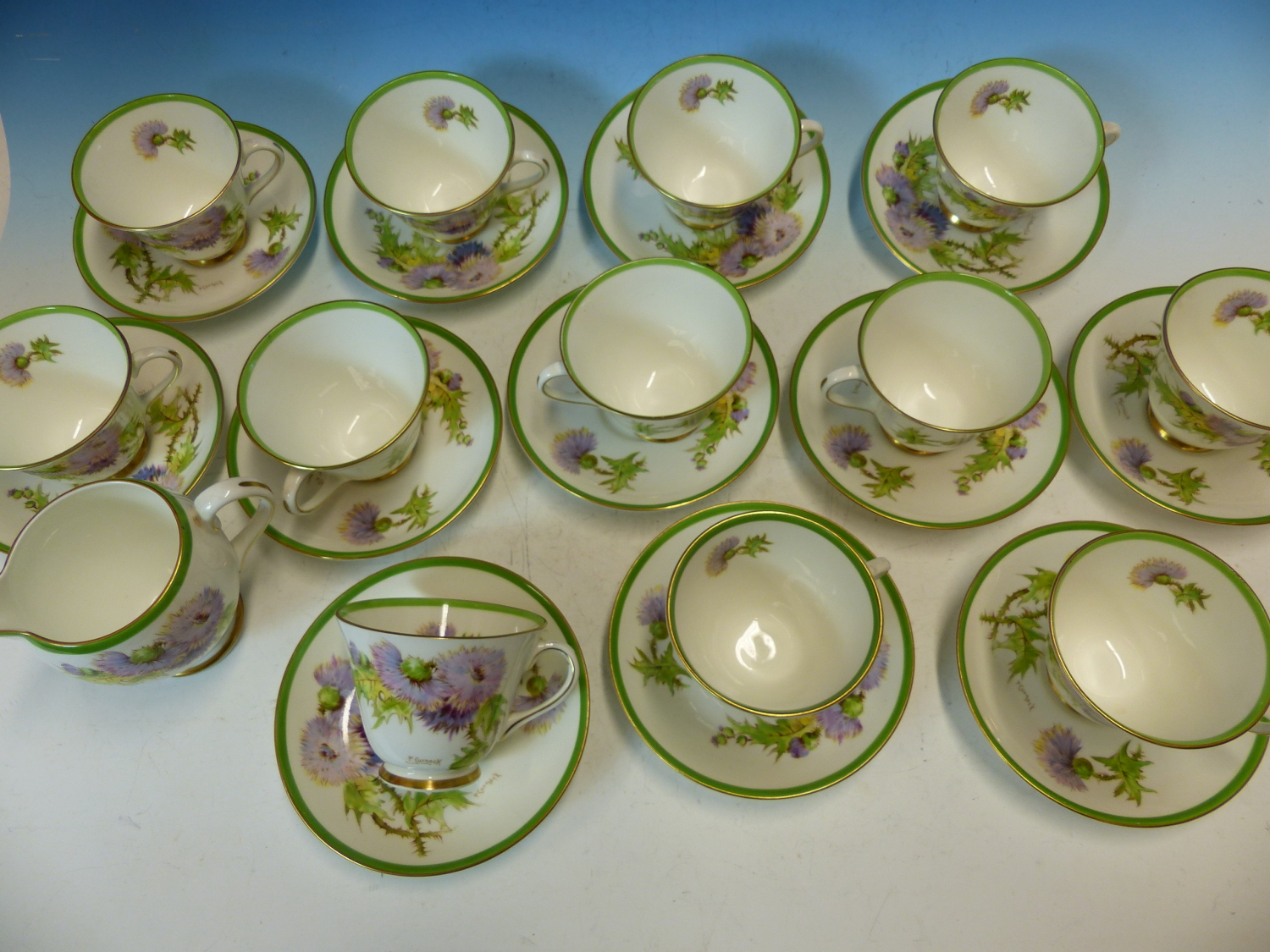 A ROYAL DOULTON GLAMIS THISTLE PATTERN TEA SET, THE TWELVE PLACE SETTINGS TO A DESIGN BY P - Image 6 of 22