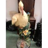 A VINTAGE UMBRELLA STAND IN THE FORM OF A STORK EMERGING FROM REEDS WITH A FROG AT THE BASE. H.
