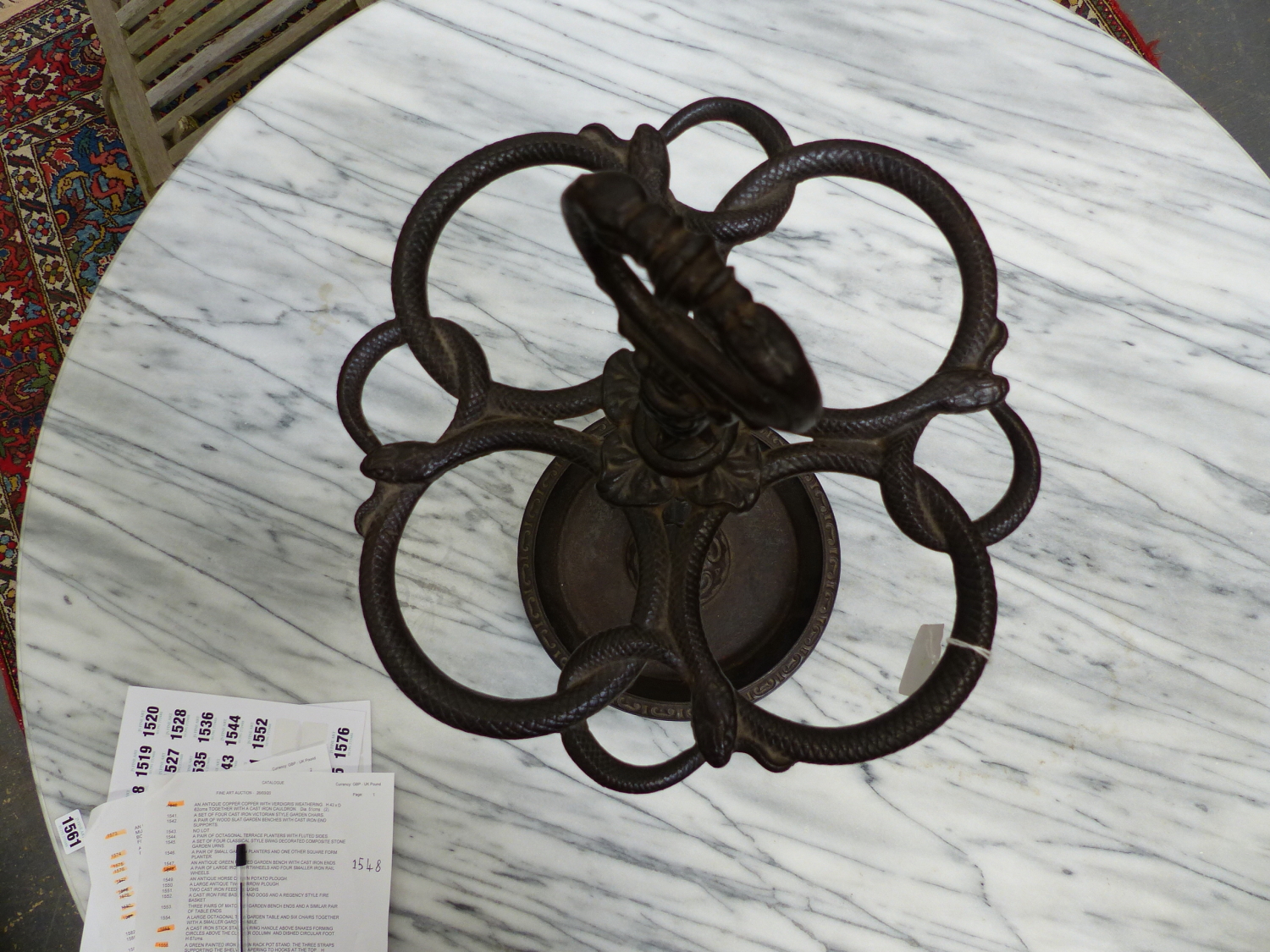 A CAST IRON STICK STAND, A RING HANDLE ABOVE SNAKES FORMING CIRCLES ABOVE THE CLUSTER COLUMN AND - Image 3 of 4