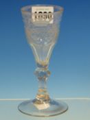 AN 18th C. GERMAN MASONIC WINE GLASS. THE BOWL ENGRAVED WITH A VERSE ON ONE SIDE ABOVE AN ORB, A