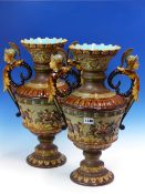 A PAIR OF SCHILLER MAJOLICA TWO HANDLED BALUSTER VASES, THE GIRTH BANDS OF ROMAN WARRIORS ON AN