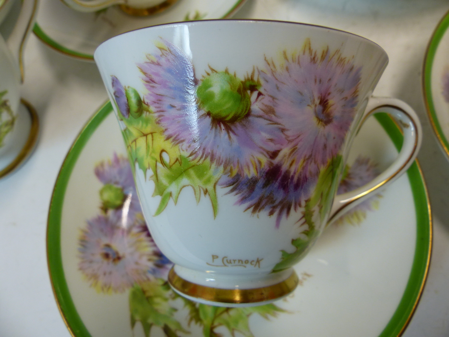 A ROYAL DOULTON GLAMIS THISTLE PATTERN TEA SET, THE TWELVE PLACE SETTINGS TO A DESIGN BY P - Image 4 of 22