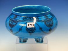 A MID VICTORIAN MINTON TURQUOISE BLUE FOOTED BOWL DECORATED IN BLACK WITH ISLAMIC SCRIPT AND