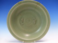 A ZHEJIANG CELADON DISH, THE CENTRE MOULDED IN RELIEF WITH TWO FISH, THE RIM WITH GOLD LACQUER