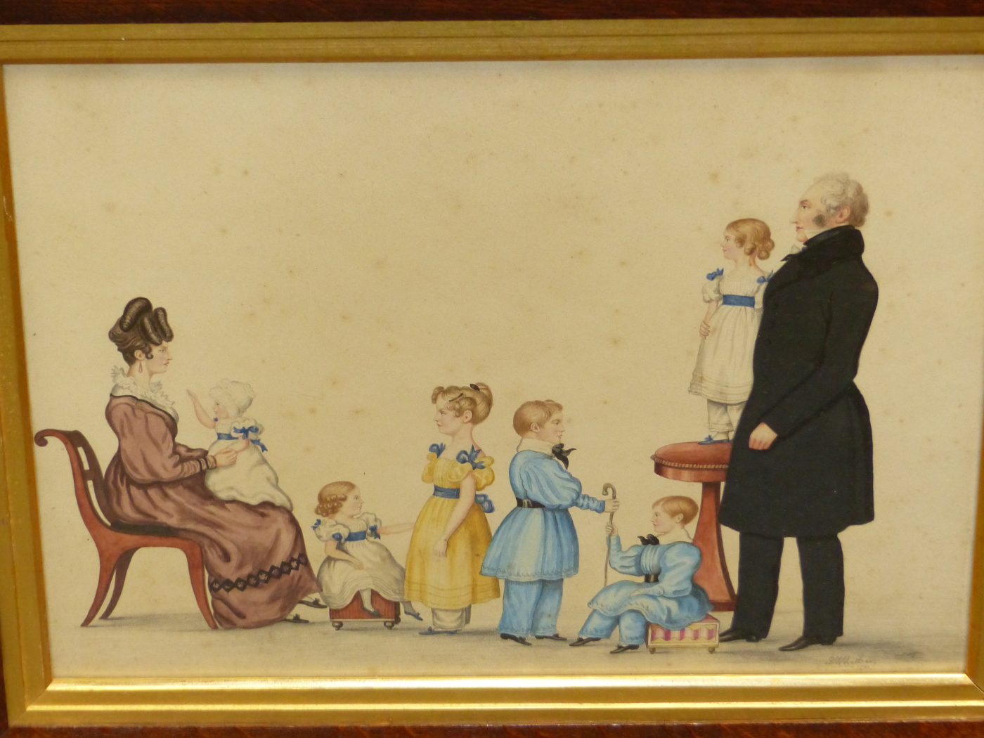 G.M.MATHEW. 19th.C.ENGLISH SCHOOL. A NAIVE FAMILY GROUP PORTRAIT SIGNED AND DATED 1831, WATERCOLOUR.