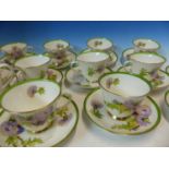 A ROYAL DOULTON GLAMIS THISTLE PATTERN TEA SET, THE TWELVE PLACE SETTINGS TO A DESIGN BY P