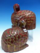 A PAIR OF EASTERN RED LACQUERED CARVED WOOD FIGURES OF QUAIL, DETAILS OF THEIR FEATHERS WITH SOME