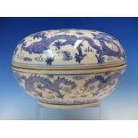A CHINESE BLUE AND WHITE BOX AND COVER, THE BUN SHAPE DECORATED WITH DRAGONS CHASING FLAMING PEARLS,