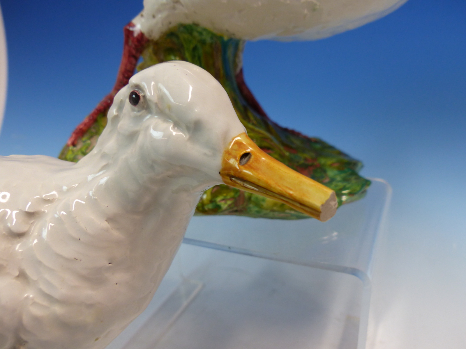 A PAIR OF MAJOLICA WHITE WADING BIRDS WITH LONG YELLOW BEAKS, THEIR RED LEGS ON GREEN FOLIAGE - Image 6 of 11