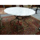 A WROUGHT IRON BASED MARBLE TOPPED CENTRE TABLE. Dia.124 x H.76cms.