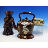 A BARGE WARE TEA POT AND STAND, A TREACLE GLAZED SNUFF TAKER TOBY JUG AND AN ALLER VALE SLIP