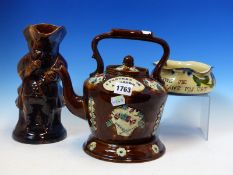 A BARGE WARE TEA POT AND STAND, A TREACLE GLAZED SNUFF TAKER TOBY JUG AND AN ALLER VALE SLIP