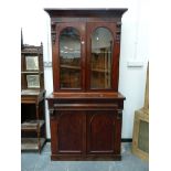 A VICTORIAN MAHOGANY BOOKCASE.