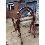 A VINTAGE CAST IRON MANGLE.