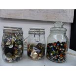 THREE JARS OF ASSORTED BUTTONS AND BEADS.