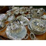 A LARGE QUANITITY OF SILVER PLATED WARES INC. TRI OF MEAT COVERS, CLARAT JUGS, TEA AND COFFEE