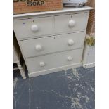 A VICTORIAN PAINTED PINE CHEST OF DRAWERS, A PINE BLANKET CHEST, WICKER LAUNDRY HAMPER, A PAINTED