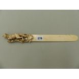 A 19TH C. IVORY CARVED LETTER OPENER.