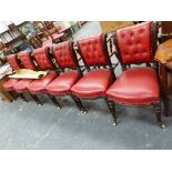 A SET OF SIX VICTORIAN LEATHER UPHOLSTERED DINING CHAIRS.