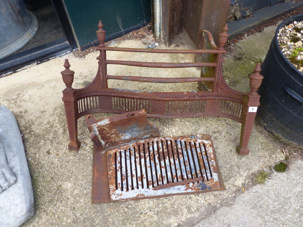 A CAST IRON FIRE BASKET.