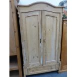 A CONTINENTAL PINE SMALL WARDROBE.