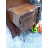 A MAHOGANY INLAID BEDSIDE CABINET.