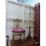 A GILT CARVED BEDROOM CHAIR AND A COAT RACK.