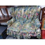 AN EARLY 20TH C. WING BACK TWO SEAT SETTEE. 1