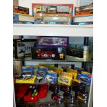 A COLLECTION OF CORGI AND OTHER DIE CAST BOXED VEHICLES (FOUR SHELVES)