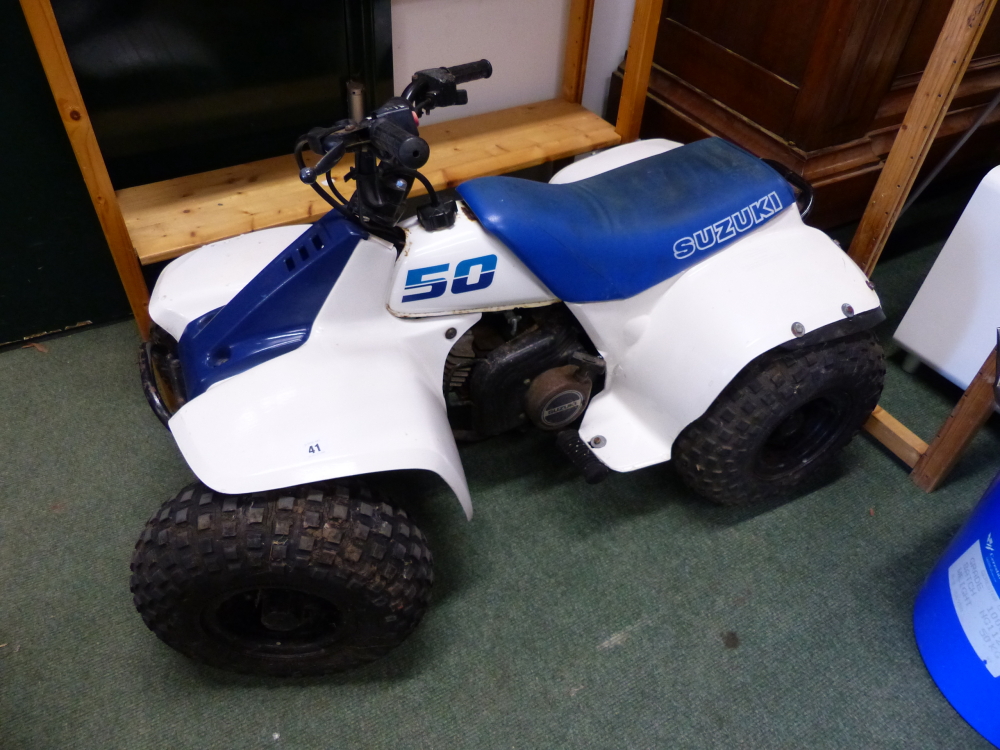 A 50CC SUZUKI QUAD BIKE.