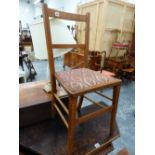 AN OAK BEDROOM CHAIR AND A WALL SHELF.