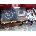 A RETRO STEREOSOUND CASSETTE/ RECORD PLAYER, AND A INTELLIVISION GAMING SYSTEM.