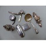 TWO SILVER BABIES RATTLES, A SILVER PILL BOX ,SIFTER SPOON, CHATELAINE PIN CUSHION, AND A SILVER PIN
