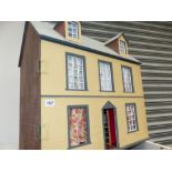 A DOLLS HOUSE AND CONTENTS.