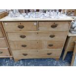 A VICTORIAN PINE CHEST OF DRAWERS TOGETHER WITH AN EDWARDIAN DRESSING TABLE.