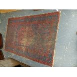 AN ANTIQUE RUG.