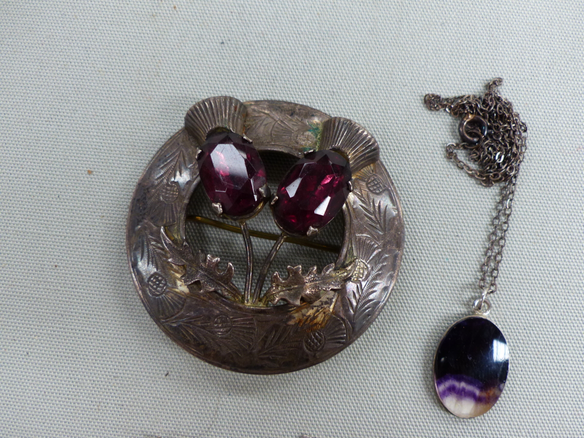 A SILVER CHARM BRACELET, A SILVER SCOTTISH THISTLE BROOCH, AND A BLUE JOHN SILVER CASED PENDANT. - Image 3 of 4