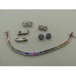 A SILVER AND RAINBOW MULTI CZ BRACELET AND EARRING SET TOGETHER WITH THREE FURTHER PAIRS OF SILVER